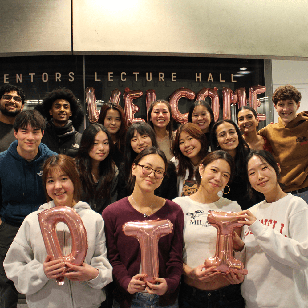 Spring 2025 new members of DTI posing together